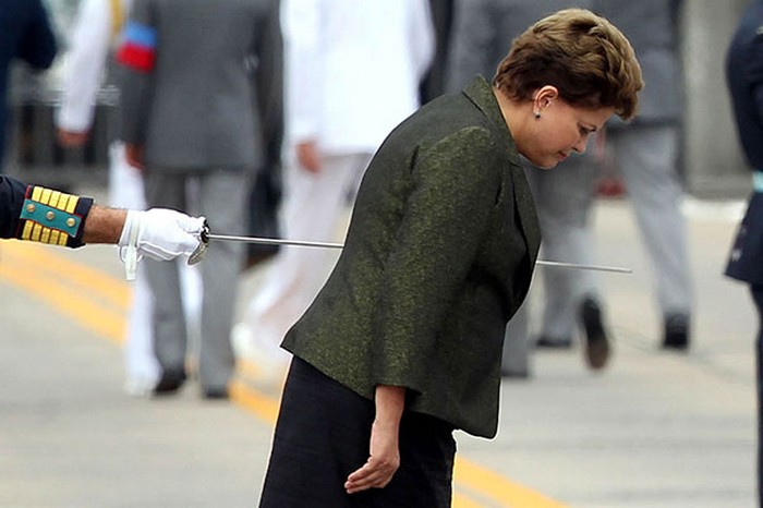 Funny perfectly timed photos: optical illusion of woman being stabbed by honor guard's sword