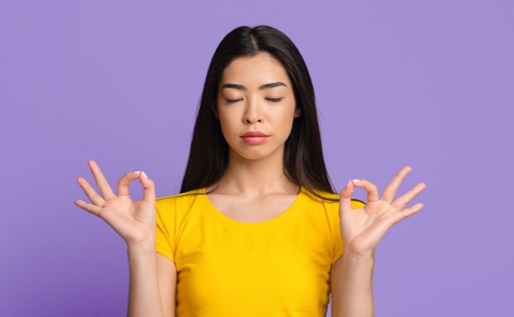 Wabi-Sabi Lessons: Asian woman meditating