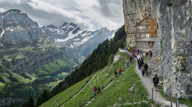 The most beautiful areas in Switzerland: mountain with house