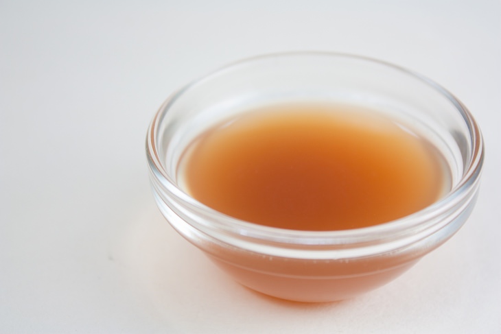 Grandma's beauty secrets: Apple cider vinegar in a glass bowl
