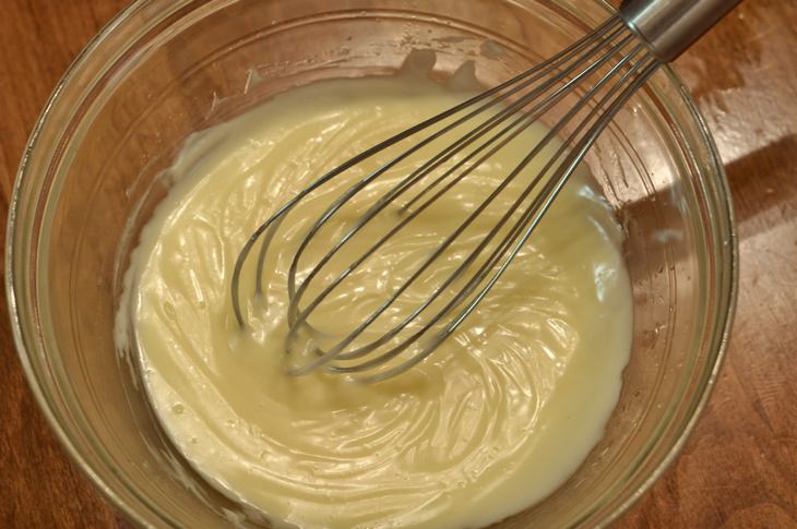 Grandma's beauty secrets: Mayonnaise in a clear bowl with a whisk
