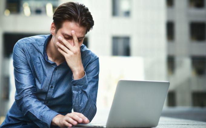 What is the legend that tells the story of your life: a man in front of a computer with a hand on his face