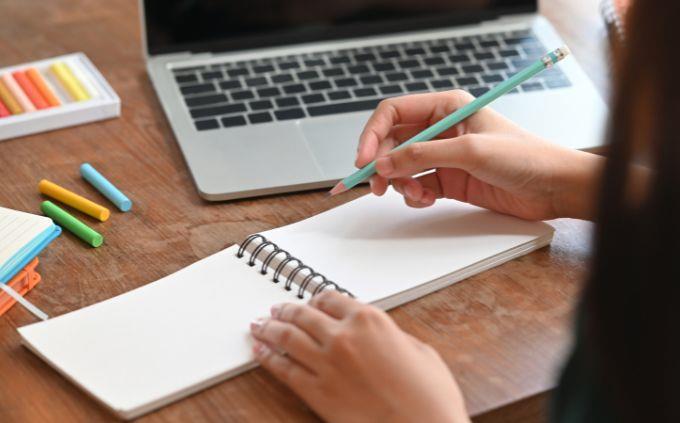 What is the legend that tells your life story: A woman works in front of a computer