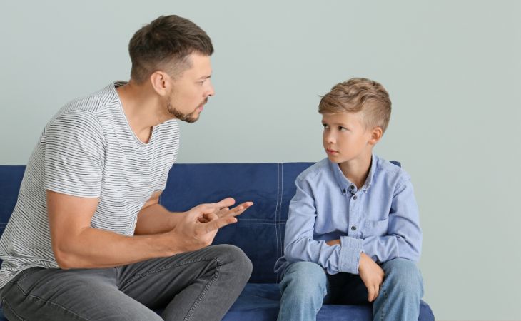 How to Stop Children from Lying by Age: A father scolding a child