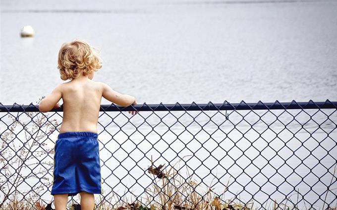 Childhood and chocolate test: A boy by a lake
