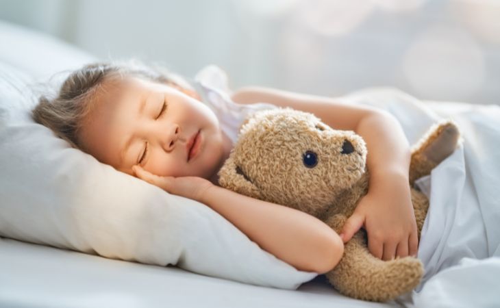 How parents harm their children’s sleep: a sleeping girl