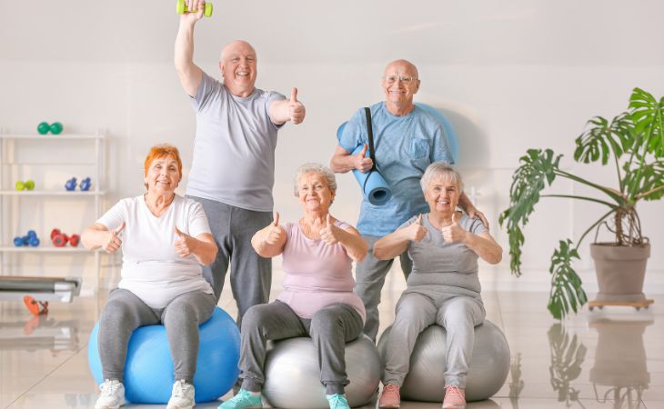 New Ways to Reduce Dementia Risk: A group of elderly people with fitness equipment