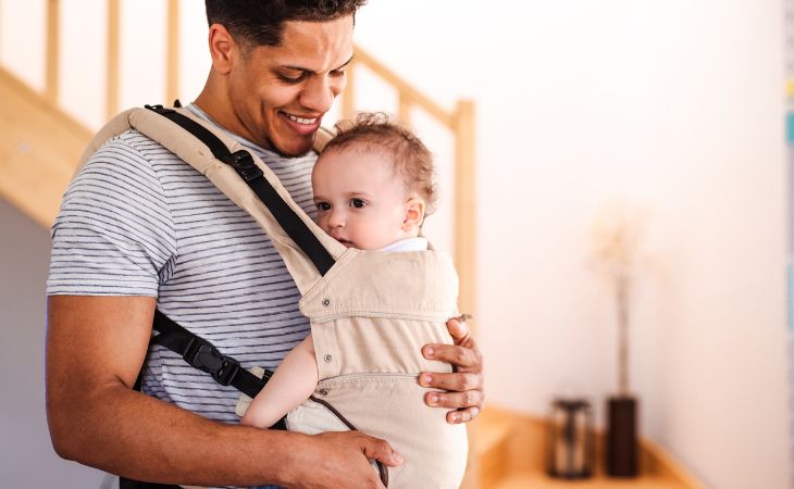 Koala Parenting: Father with baby in a carrier