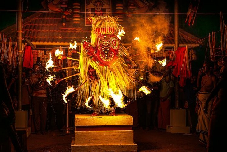 Photos from the 1839 Awards photography competition: Man in traditional clothing during a fire performance