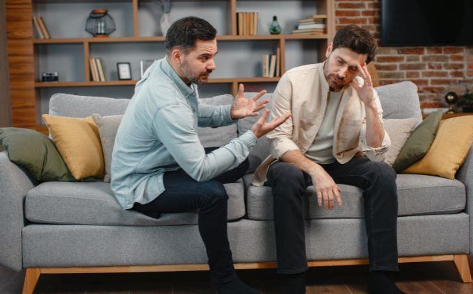 What is your communication style: a man talking to another man who looks stressed