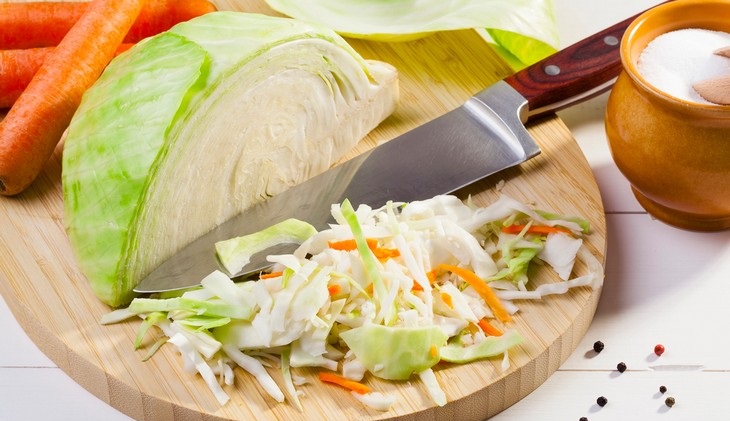 How long can you keep a salad in the fridge: Cabbage on a cutting board