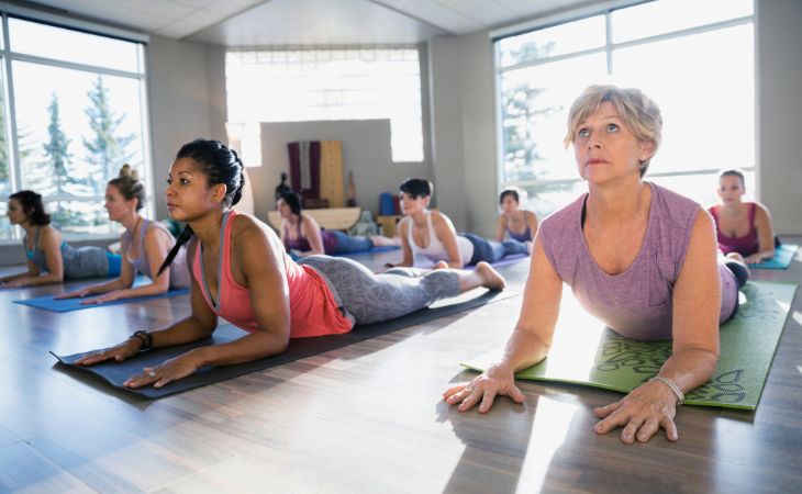Tummy time for adults: Women performing a tummy time exercise