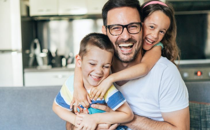 How to spend the day having fun with the kids: Dad and kids laughing