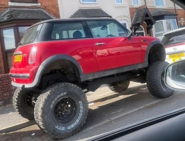 Failed designs and funny signs: Small car with oversized wheels