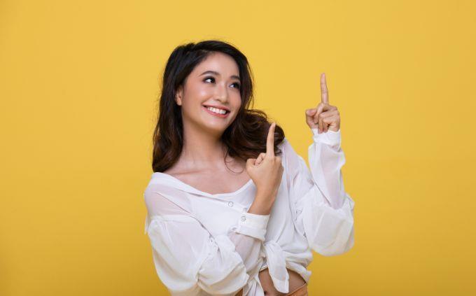 Trivia Women influence history: a woman pointing up