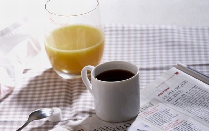 Coffee Upgrades: A cup of coffee next to a glass of orange juice