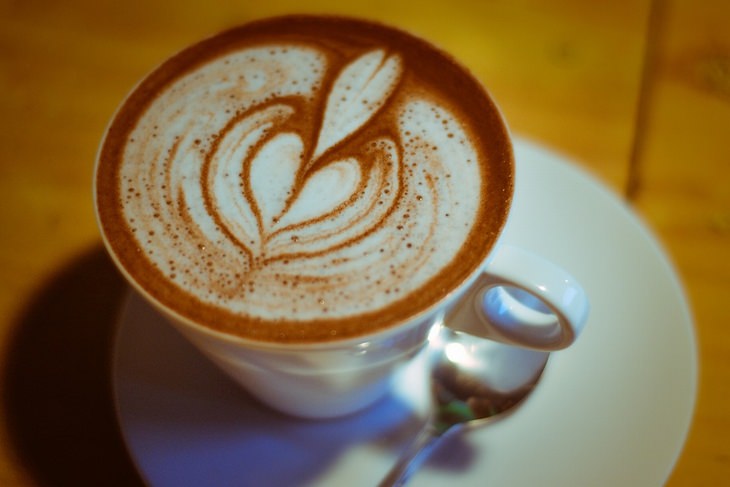 Coffee Upgrades: A latte with a heart-shaped foam design