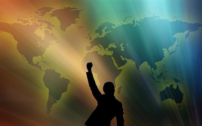 World geography test: a figure in a victory pose on a map background
