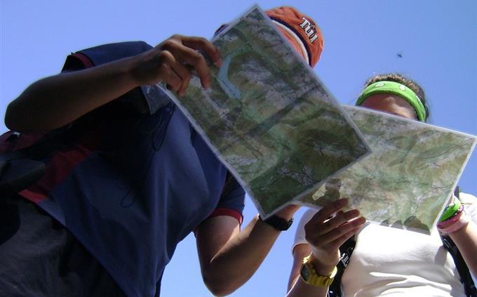 World Geography Test: People look at a map