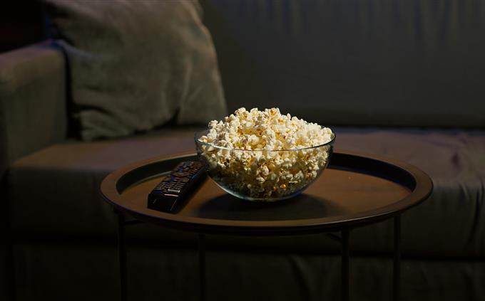 Test of emotional limits: a table in the living room with popcorn and a TV remote