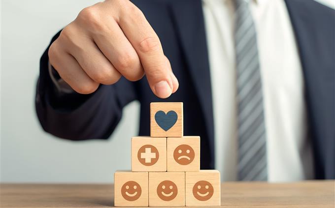 Test of emotional limits: a man in a suit builds emotions