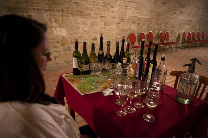 10 recommended attractions in Budapest: a table with wine bottles in the Faust cellar