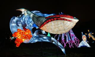 Inflatable Dinosaurs Light Up the Streets of Paris