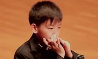 This Boy's Harmonica Skills Are Outstanding!