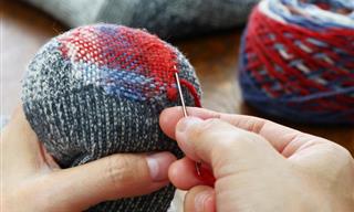 Holes in Your Socks? Here's Your Guide to Mending Knit and Woven Garments
