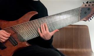 Watch This Man Play a 14-String Guitar